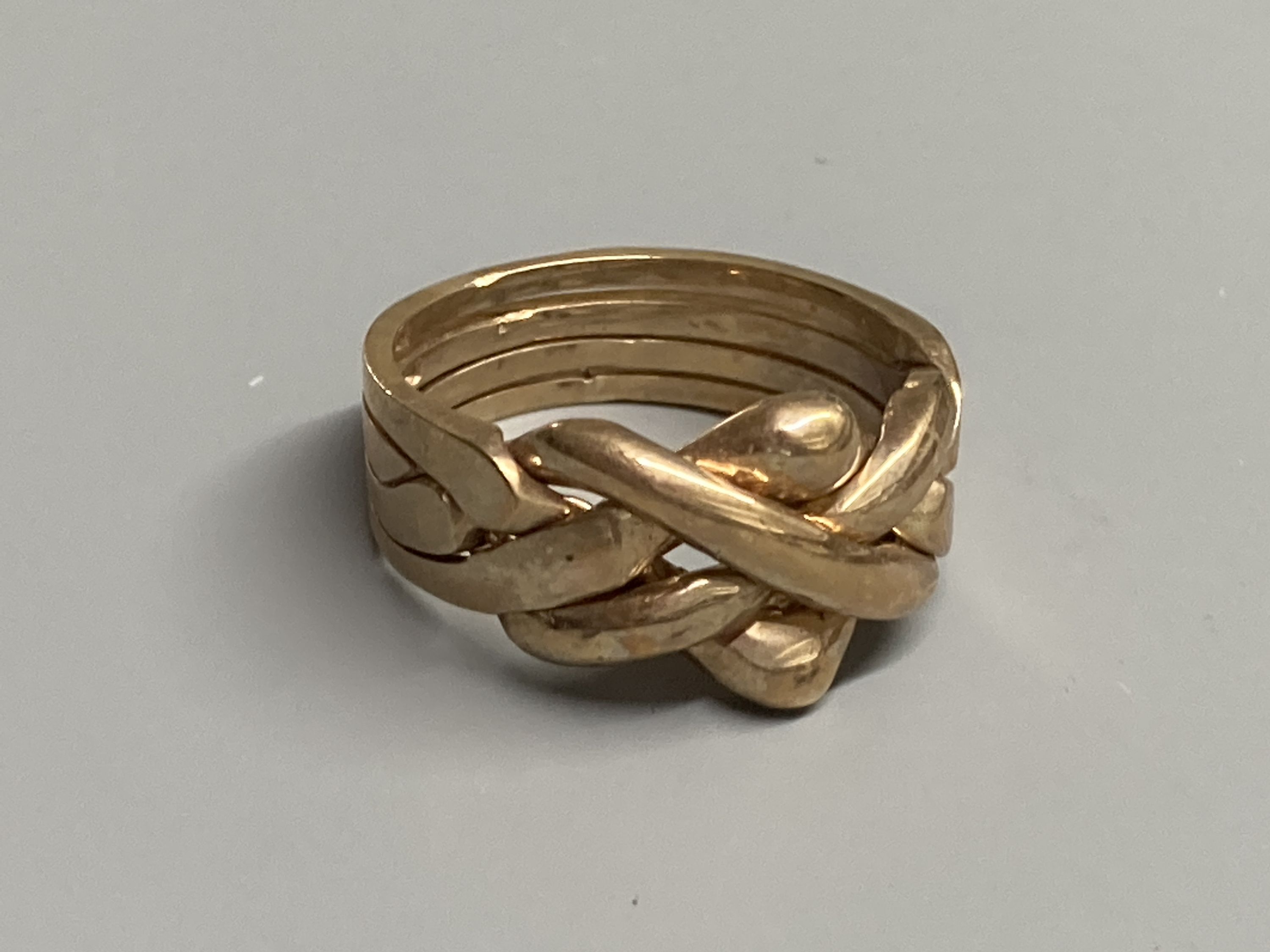 Four assorted modern 9ct gold rings including two claddagh rings